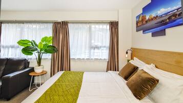 Family Suite, 1 Bedroom | 2 bedrooms, desk, soundproofing, iron/ironing board