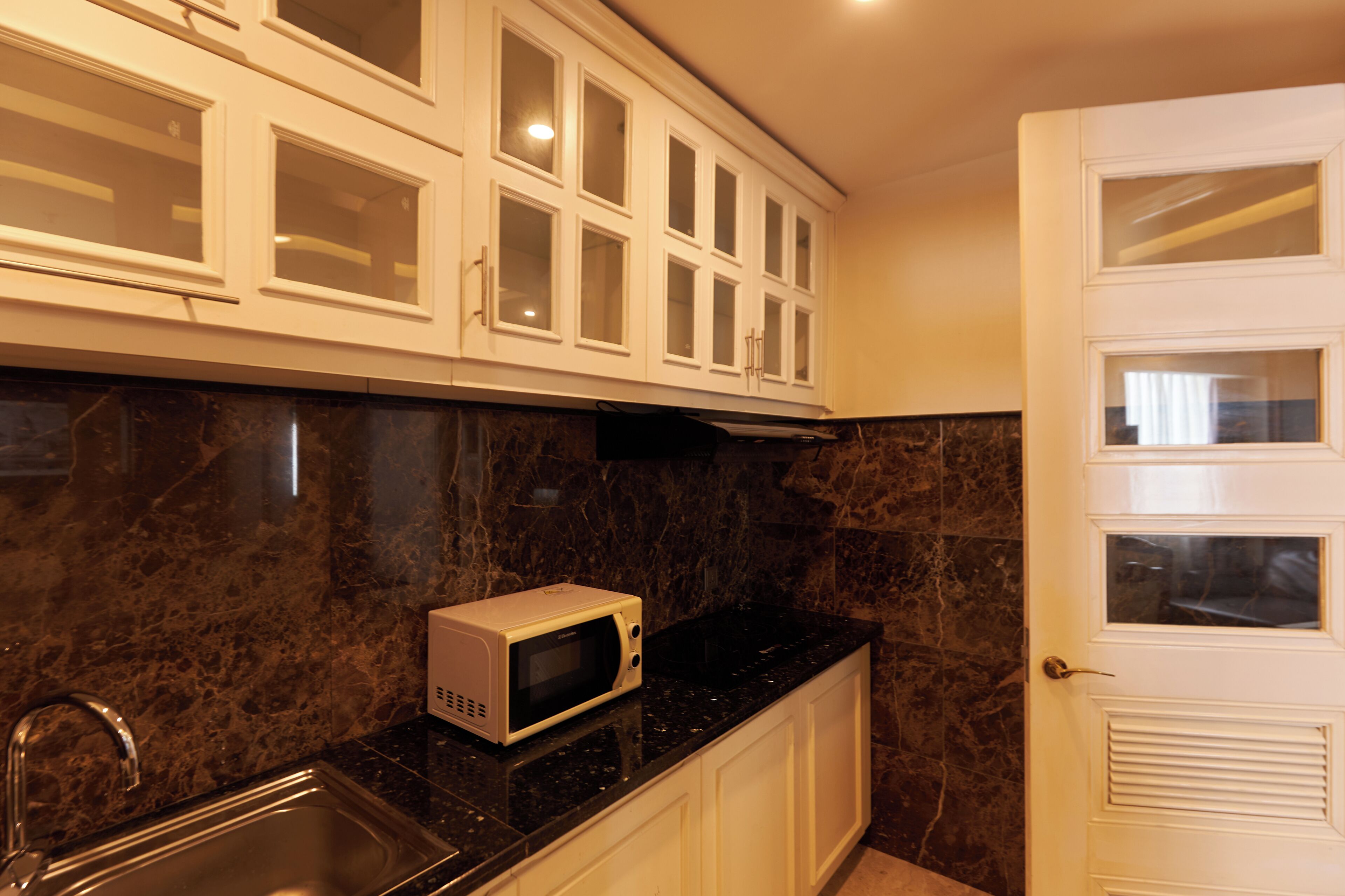 two bedroom apartment | private kitchen | mini-fridge, microwave, coffee/tea maker, electric kettle