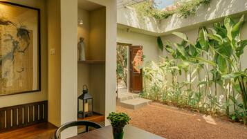 Deluxe King Room with Private Courtyard & Sitting Area - Early Check-in & Late Check-out | 13 bedrooms, in-room safe, iron/ironing board, free WiFi