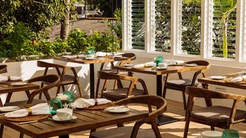 Breakfast, lunch, dinner served; international cuisine, garden views