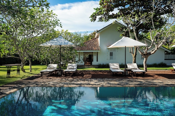 2 outdoor pools, pool umbrellas, pool loungers