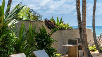 On the beach, sun-loungers, beach umbrellas, beach towels