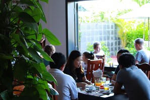 Breakfast, lunch, dinner served; international cuisine, pool views 