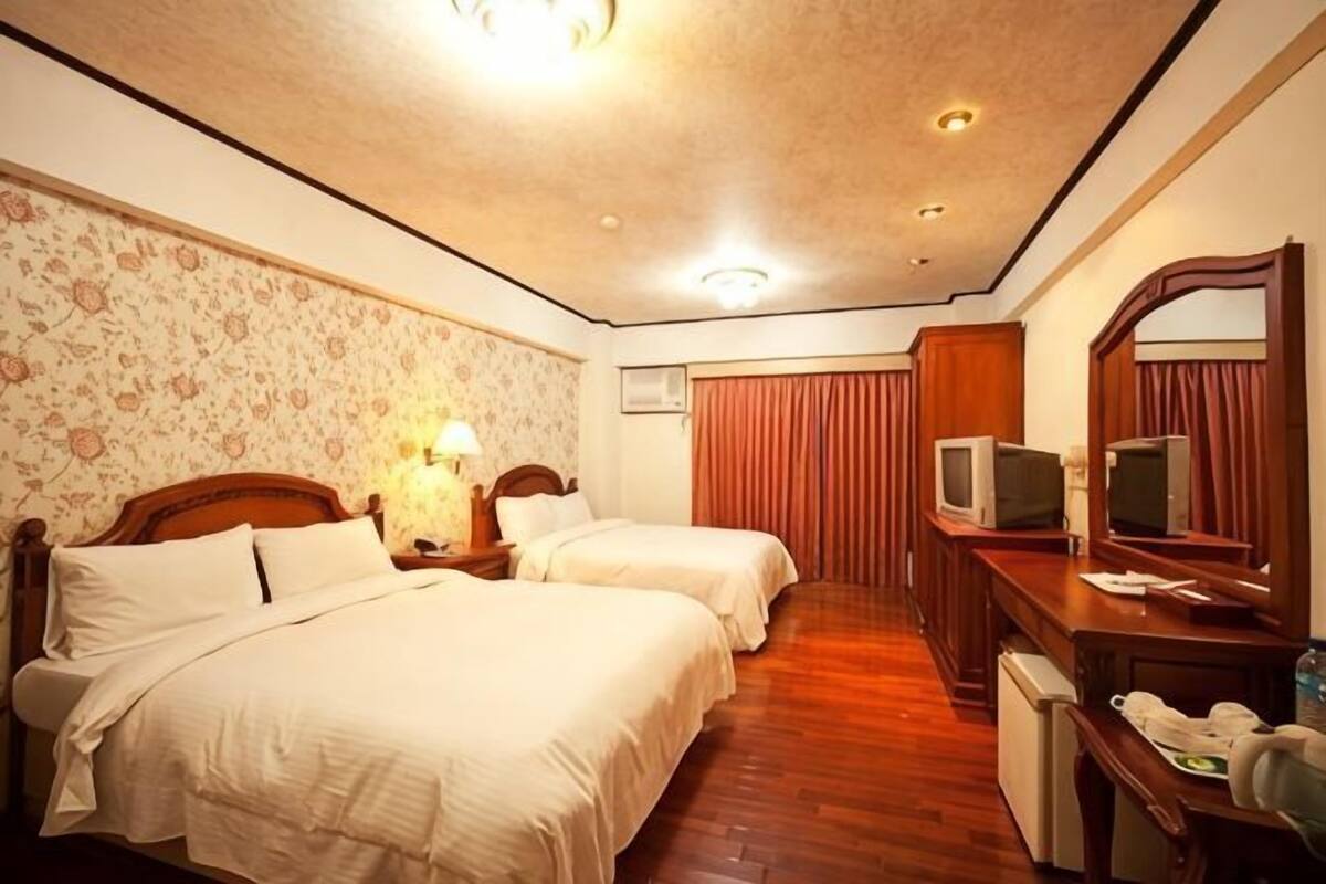 Down comforters, blackout drapes, WiFi (free)