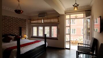 Suite, 1 King Bed, Refrigerator | In-room safe, desk, iron/ironing board, rollaway beds