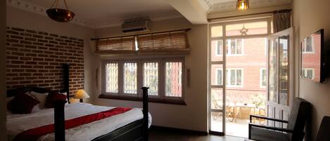 Suite, 1 King Bed, Refrigerator | In-room safe, desk, iron/ironing board, rollaway beds