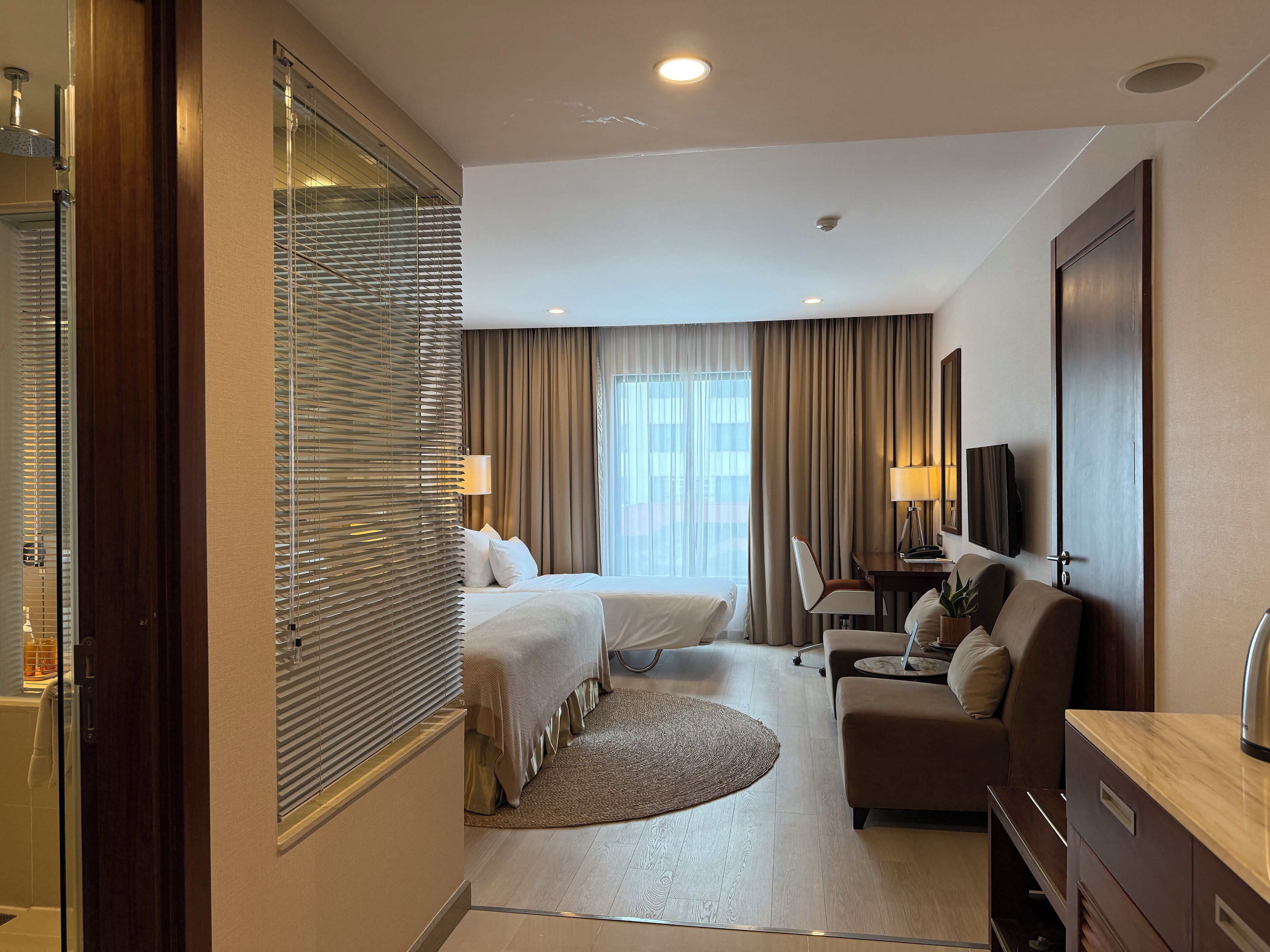 premium triple room, city view | bathroom | rainfall showerhead, free toiletries, hair dryer, bathrobes