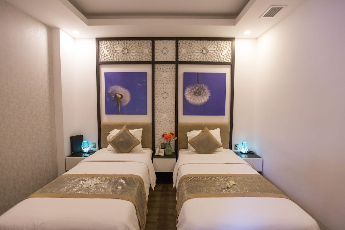 Standard Twin Room (No Window) | Minibar, in-room safe, desk, rollaway beds