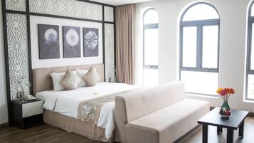 Deluxe Double Room, City View | Minibar, in-room safe, desk, rollaway beds