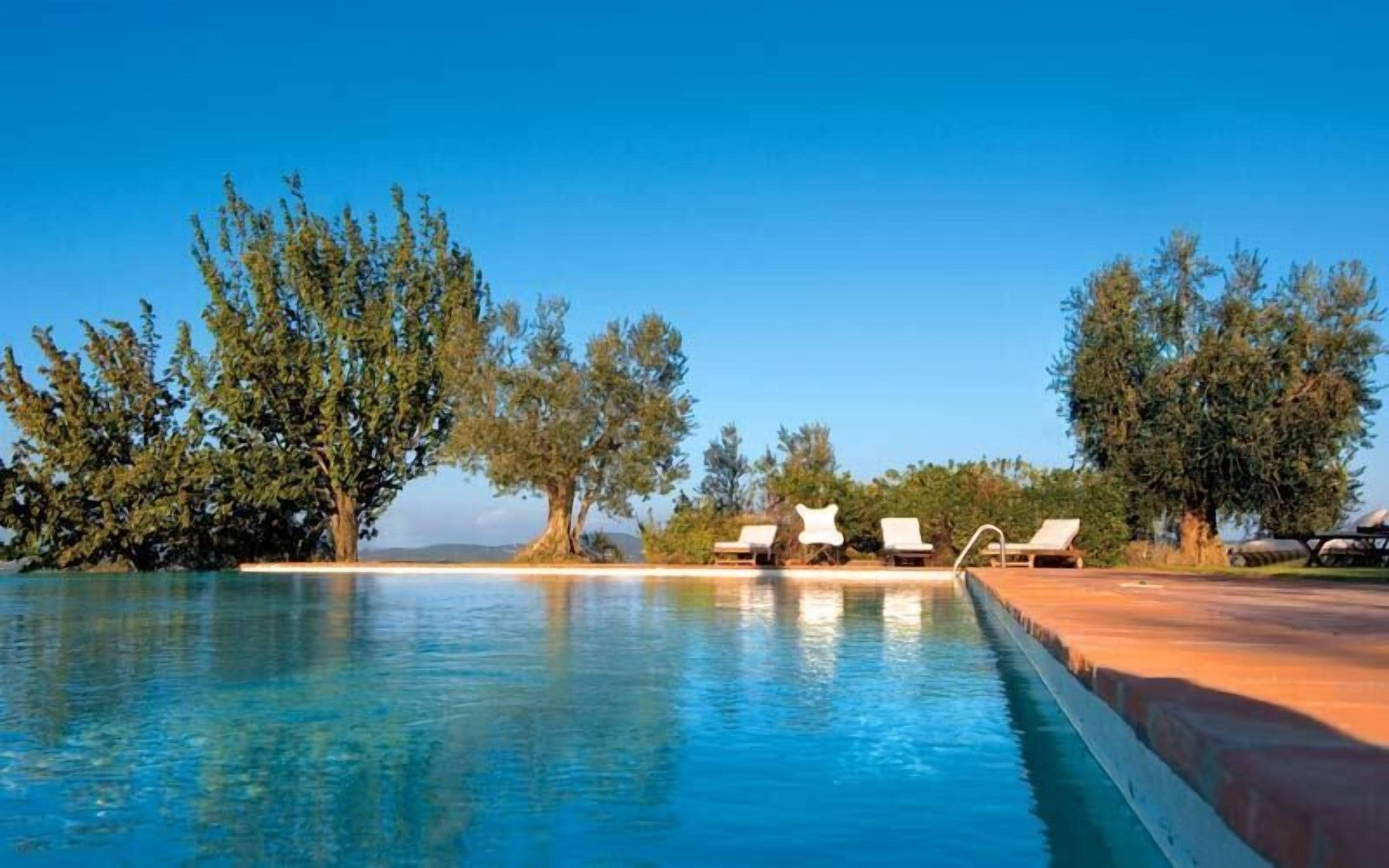 Outdoor pool, pool umbrellas, pool loungers