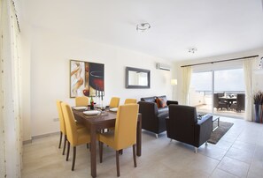 Apartment, 2 Bedrooms, Sea View | Living area | Flat-screen TV - Chloraka Terrace Apartments (Chlorakas)
