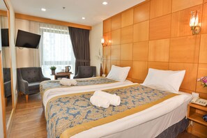 Quarto standard | Frigobar, cofres nos quartos, cortinas blackout, quartos à prova de som