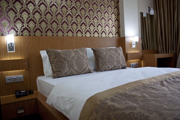 Premium bedding, minibar, in-room safe, desk