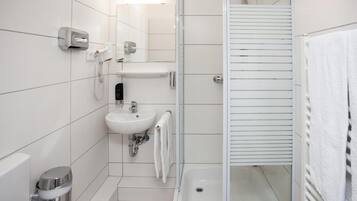 Shower, free toiletries, hair dryer, towels