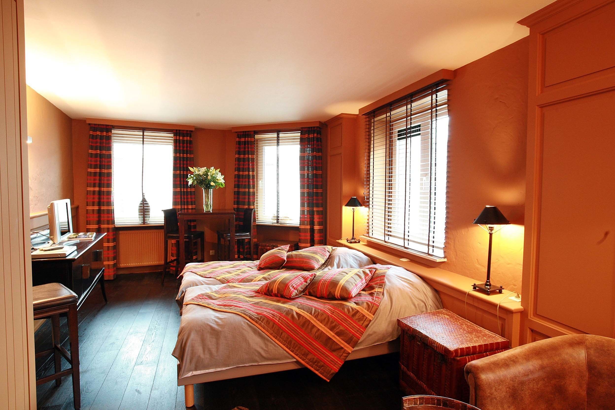 Suíte real, vista para o oceano, no canto | Cofres nos quartos, individualmente decorados