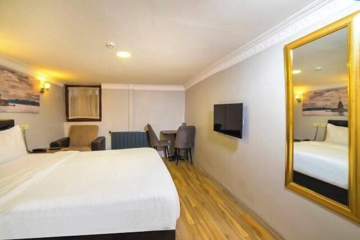 Ropa de cama de alta calidad, edredón, camas Select Comfort y minibar