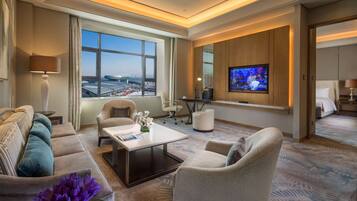 Deluxe One Bedroom Suite with Lounge Access | Living area | 42-inch flat-screen TV with satellite channels, TV