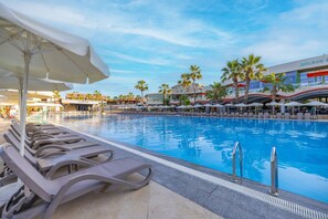 Indoor pool, outdoor pool, pool umbrellas, sun loungers