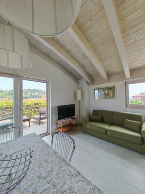 Superior Suite, 1 Bedroom, Terrace, Tower | Living area | Flat-screen TV