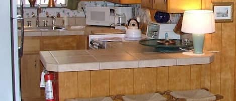 Suite, 1 Bedroom, Patio (Upstairs Room) | In-room dining