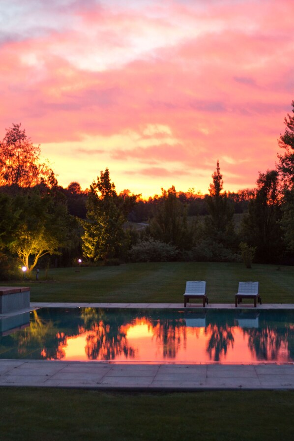 Seasonal outdoor pool, pool umbrellas, pool loungers