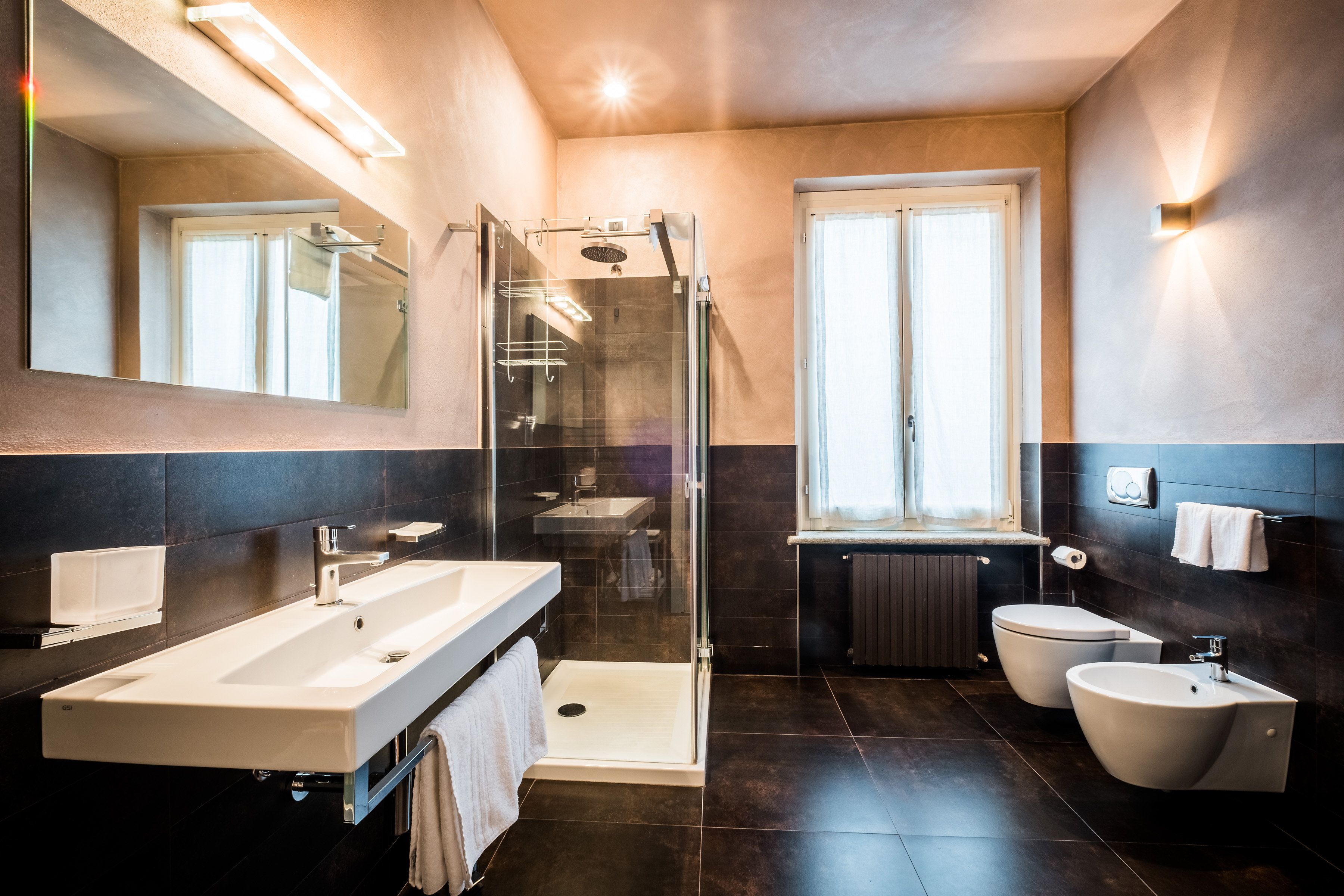 luxury double room, 1 double bed, patio, park view | bathroom | shower, rainfall showerhead, free toiletries, hair dryer