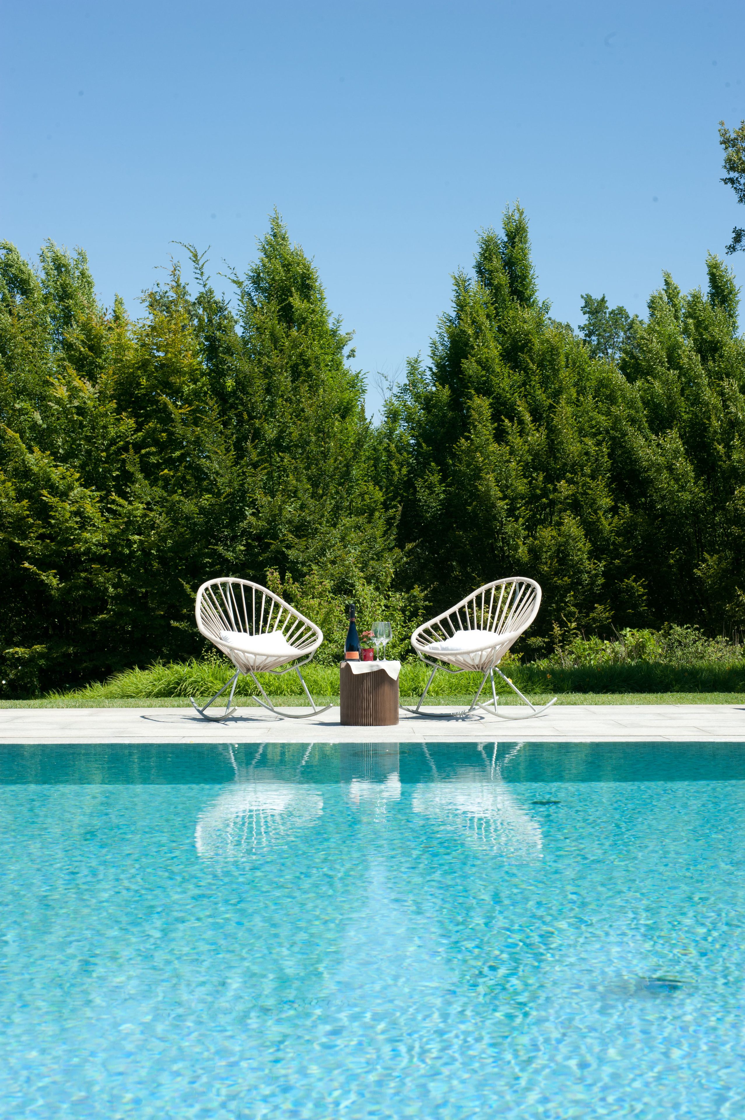 seasonal outdoor pool, pool umbrellas, pool loungers