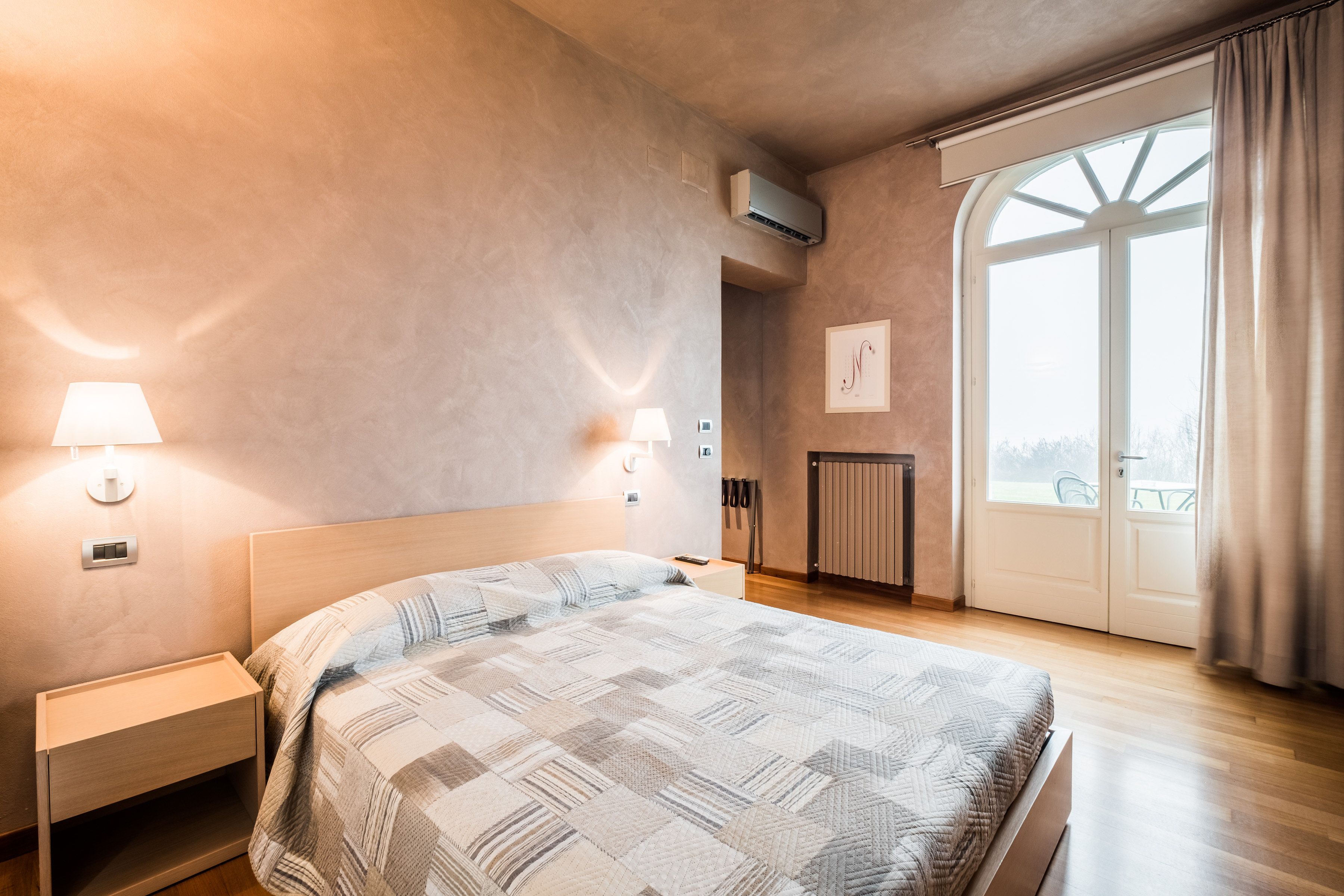 luxury double room, 1 double bed, patio, park view | minibar, in-room safe, desk, blackout curtains