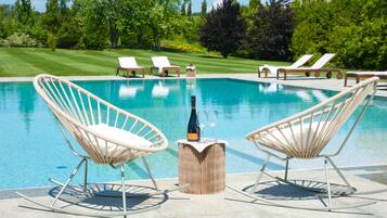 Seasonal outdoor pool, pool umbrellas, pool loungers
