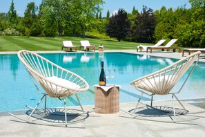 Seasonal outdoor pool, pool umbrellas, pool loungers