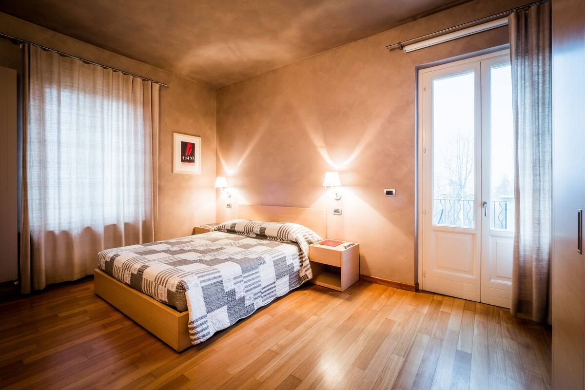 luxury double room, 1 double bed, patio, park view | minibar, in-room safe, desk, blackout curtains