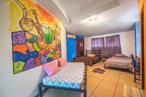 Standard Quadruple Room, 1 Bedroom, Shared Bathroom, Garden View | Premium bedding, free WiFi, bed sheets - Pura Vida Hostel (Tamarindo)
