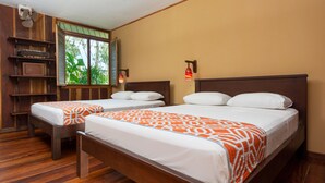 A hotel room with two wooden beds, a window with blinds, a shelf unit, and a wall-mounted lamp. - Laguna Lodge (Colorado)