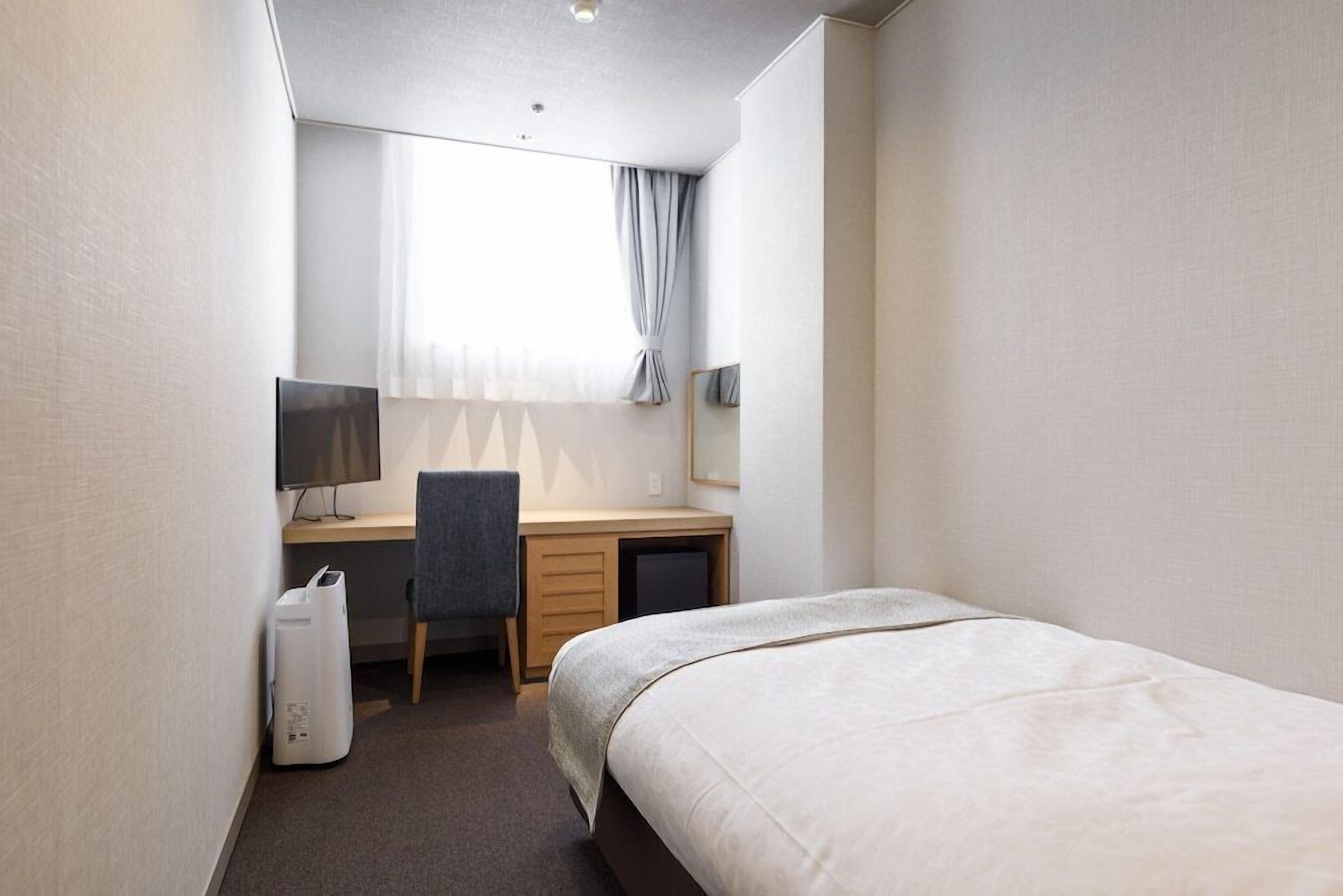 Caja de seguridad en la habitación, wifi gratis y ropa de cama 