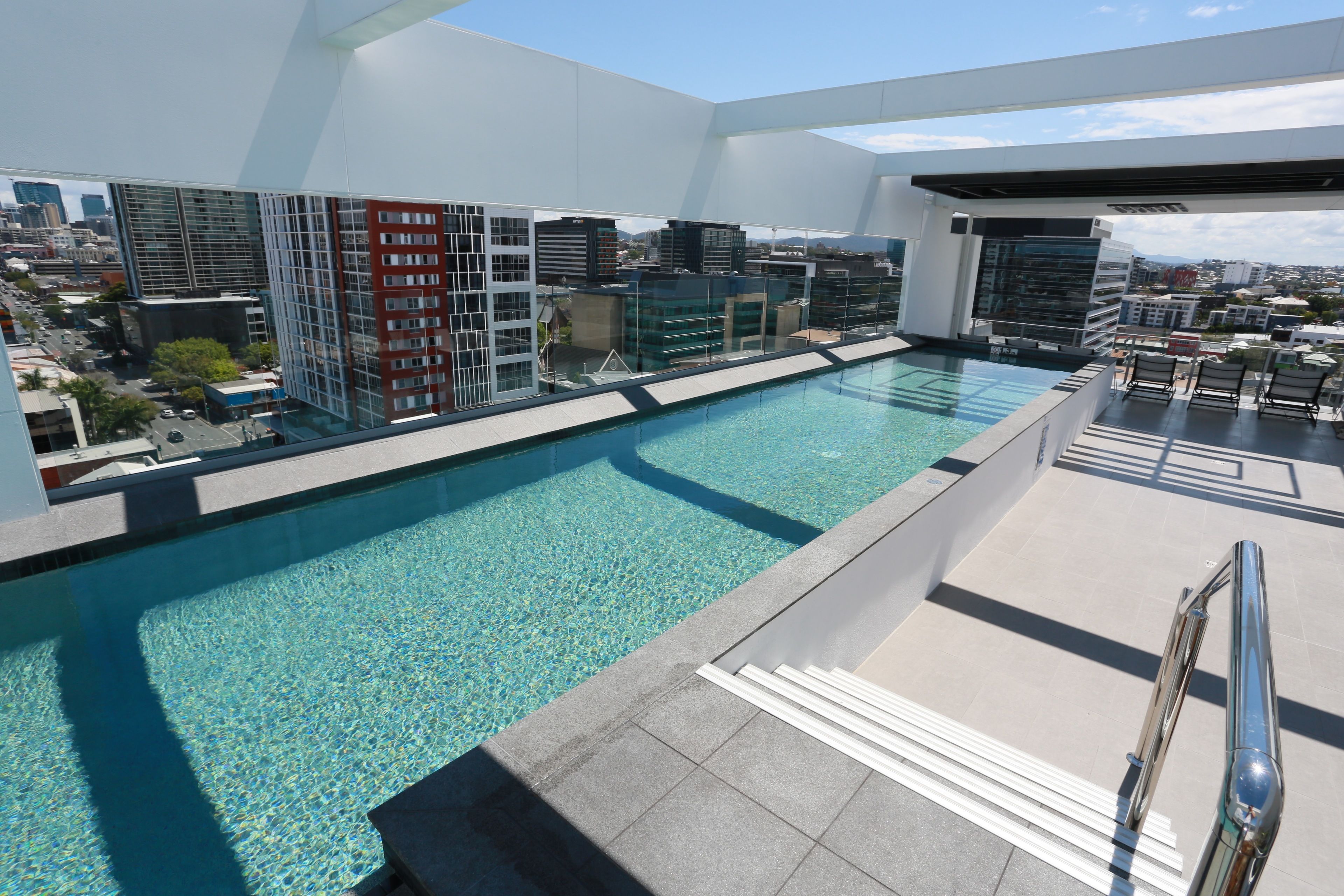 Outdoor pool, open 6:00 AM to 10:00 PM, sun loungers