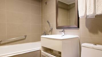 Hair dryer, slippers, towels, shampoo