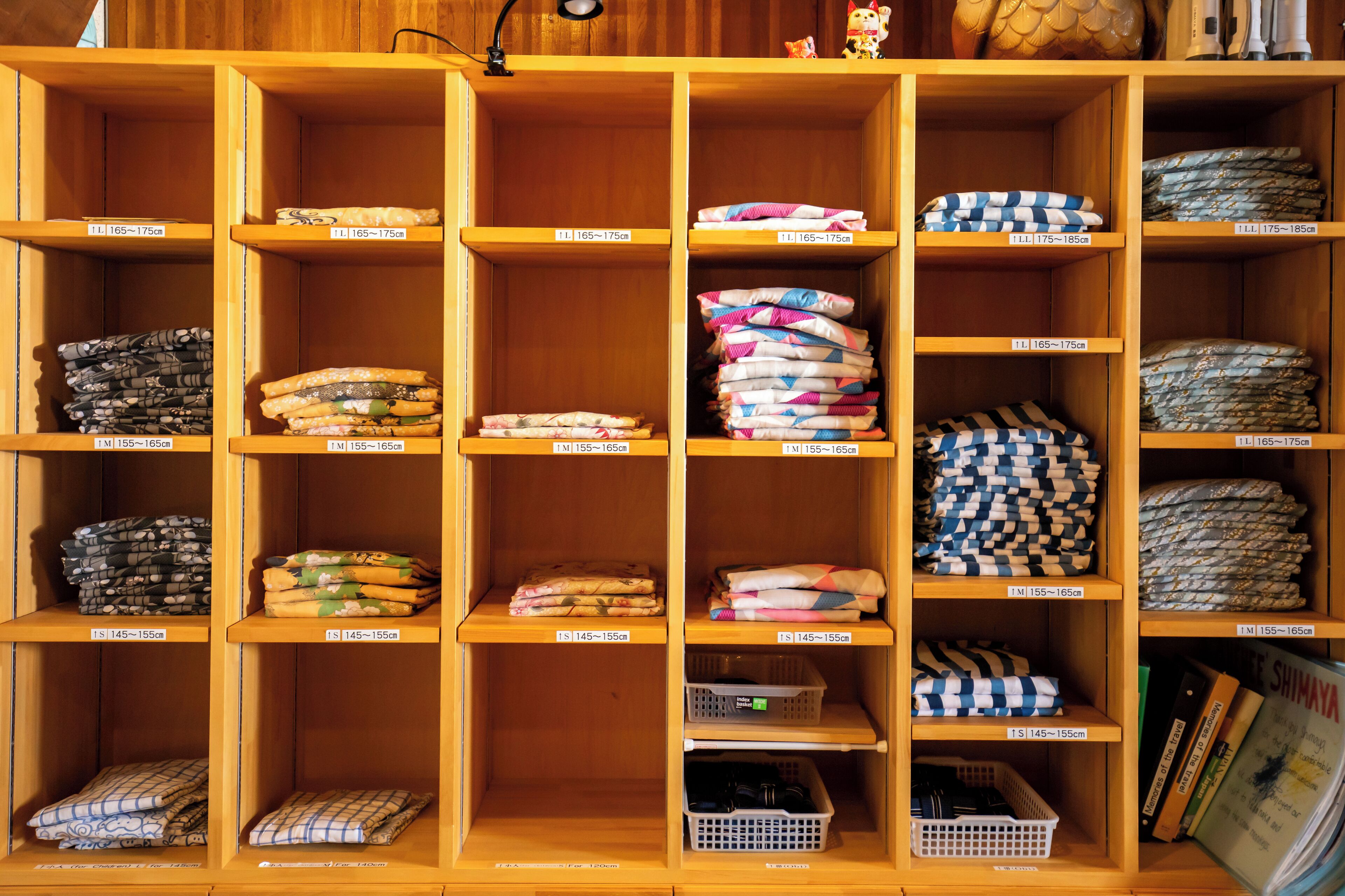 A storage unit with multiple compartments, each labeled with size dimensions.