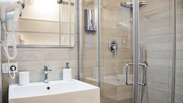 Shower, free toiletries, hair dryer, bidet