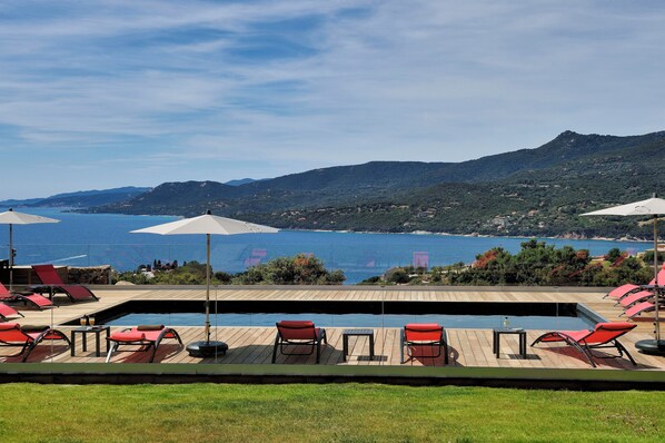 2 outdoor pools, pool umbrellas, pool loungers