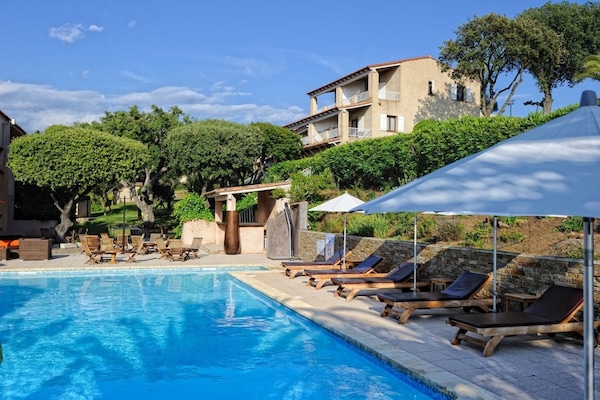 2 outdoor pools, pool umbrellas, pool loungers
