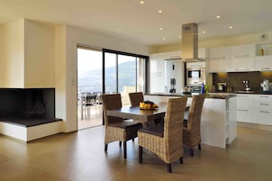 Suite, 3 Bedrooms, Sea View | Private kitchen | Coffee/tea maker, fridge, microwave, oven