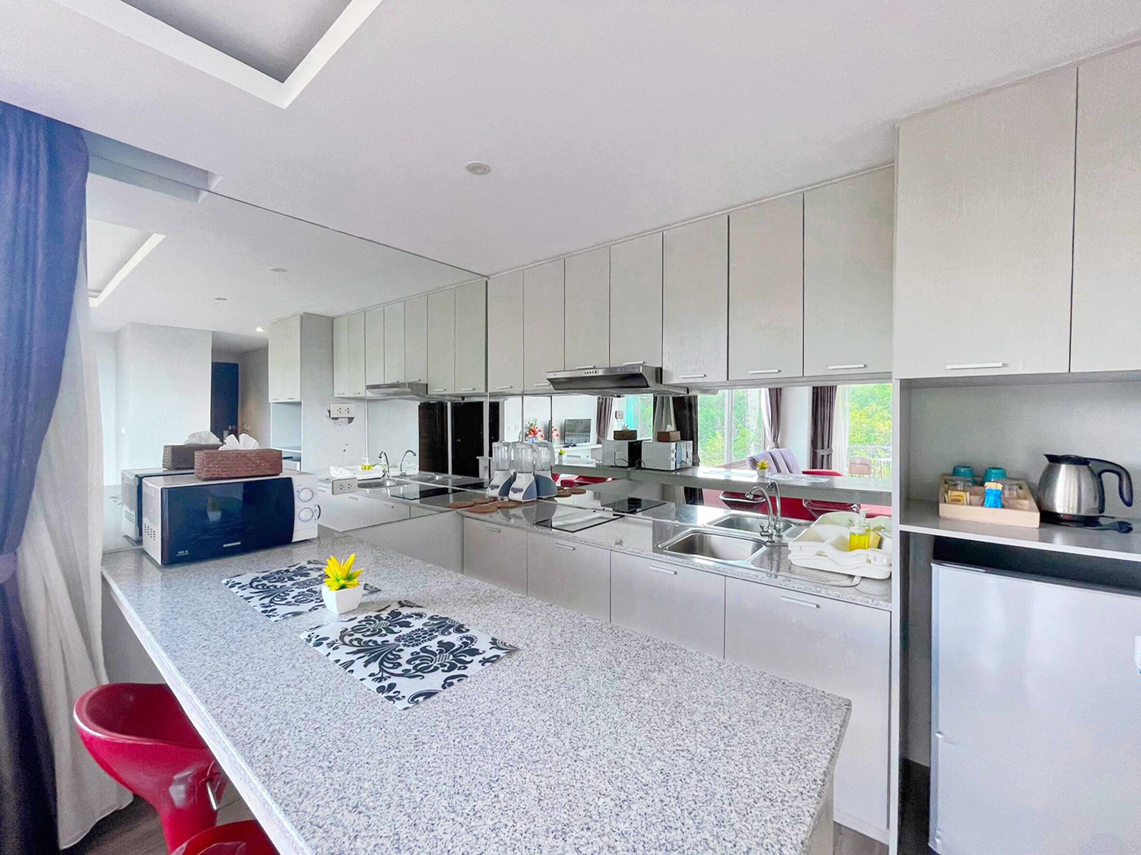 grand deluxe room | private kitchen | fridge, microwave, coffee/tea maker, electric kettle