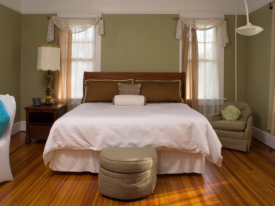 Room (The Green Room) | Premium bedding, memory foam beds, individually decorated