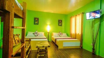 Standard Room, Multiple Beds | Living area | 32-inch LCD TV with cable channels, TV