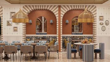 3 restaurants, breakfast, lunch, dinner served; international cuisine