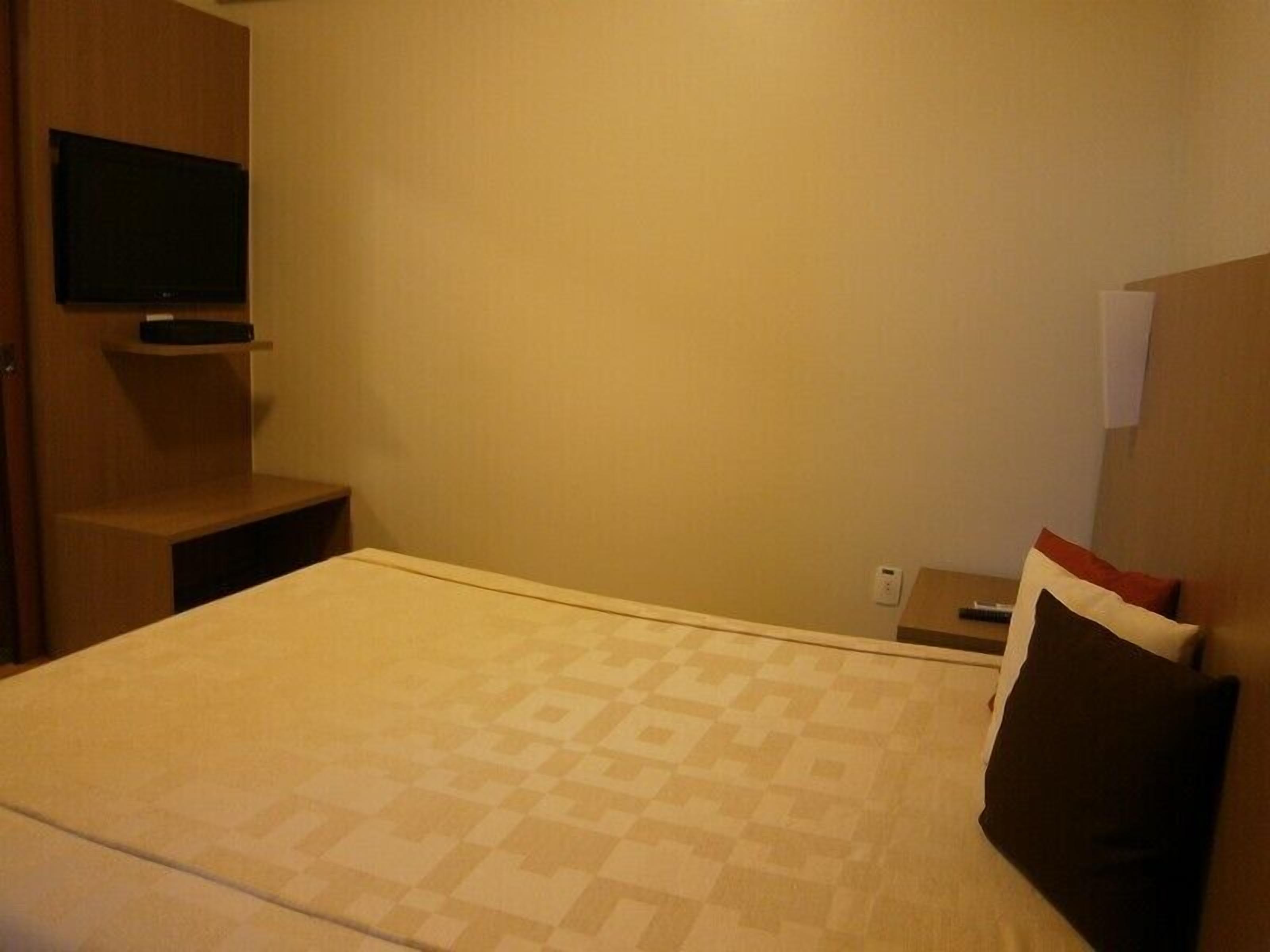 minibar, desk, blackout curtains, iron/ironing board