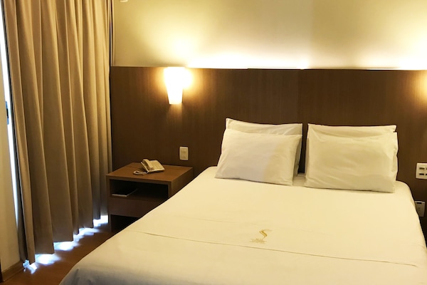 Minibar, desk, blackout drapes, iron/ironing board