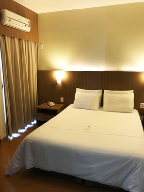 Minibar, desk, blackout curtains, iron/ironing board