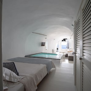 Honeymoon Cave Suite with 2 Hot Tubs (Caldera View) | Premium bedding, in-room safe, soundproofing, iron/ironing board - Zenith Blue Traditional Houses (Santorini)