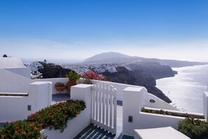 Honeymoon Cave Suite with 2 Hot Tubs (Caldera View) | Premium bedding, in-room safe, soundproofing, iron/ironing board - Zenith Blue Traditional Houses (Santorini)